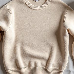 cream-cashmere-sweater-flat-lay